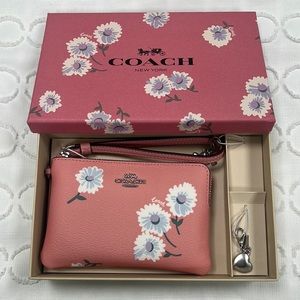 Brand New in box Coach Wristlet and charm, pink with flowers, heart charm